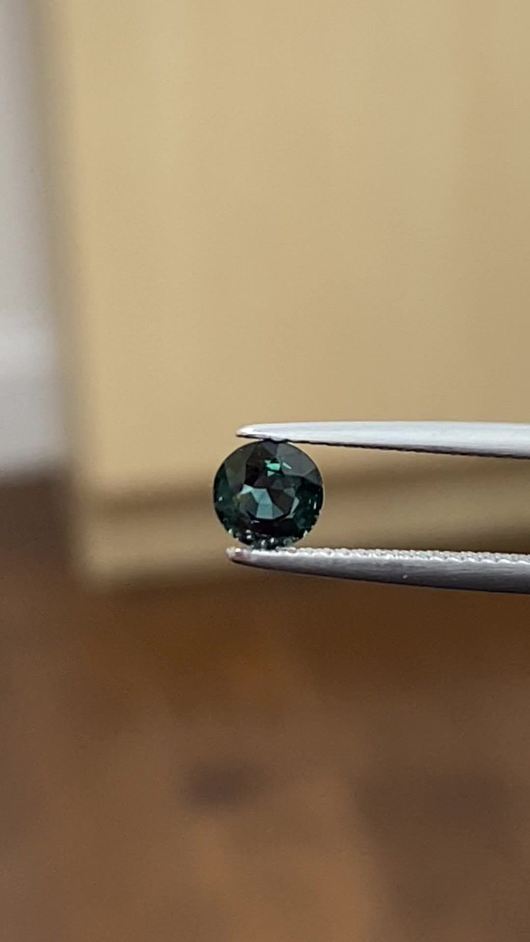 0.76 Carat Green Round Sapphire