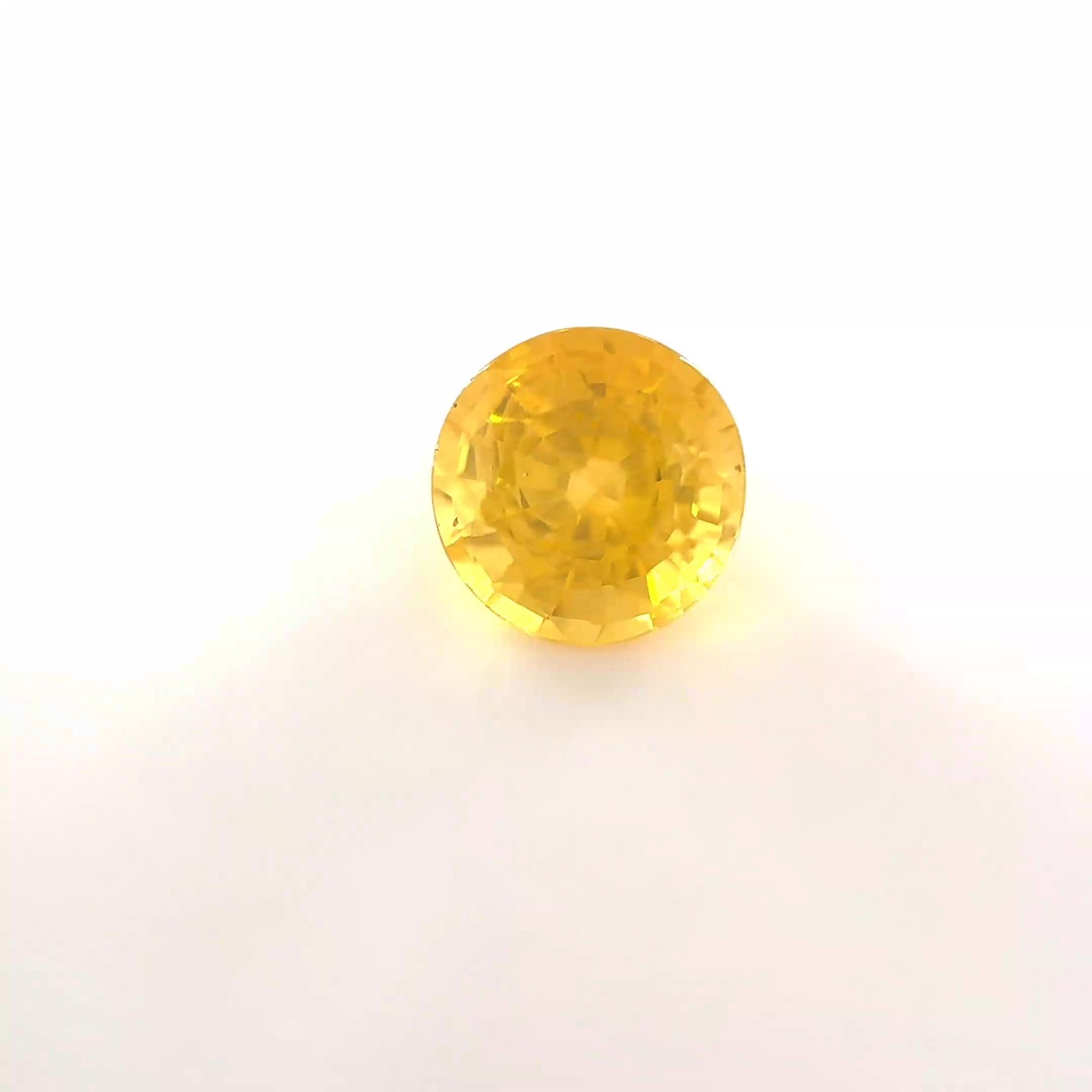 0.87 Carat Yellow Round Sapphire