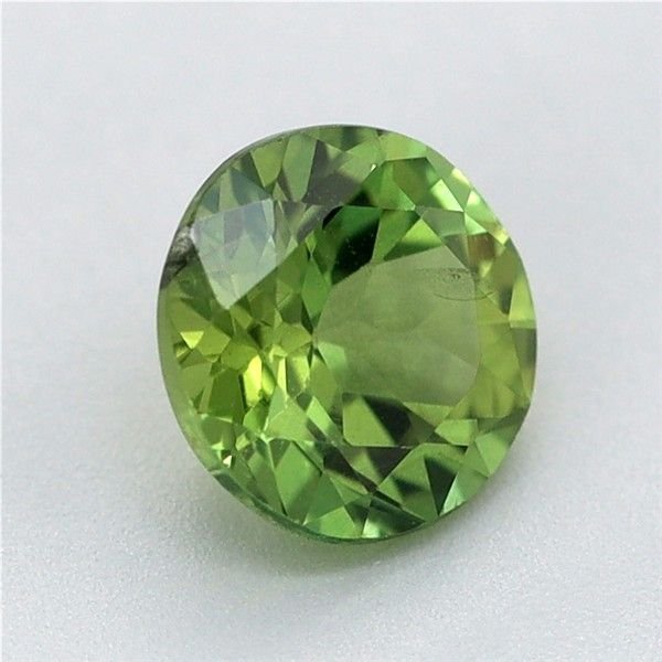 0.73 Carat Green Round Sapphire