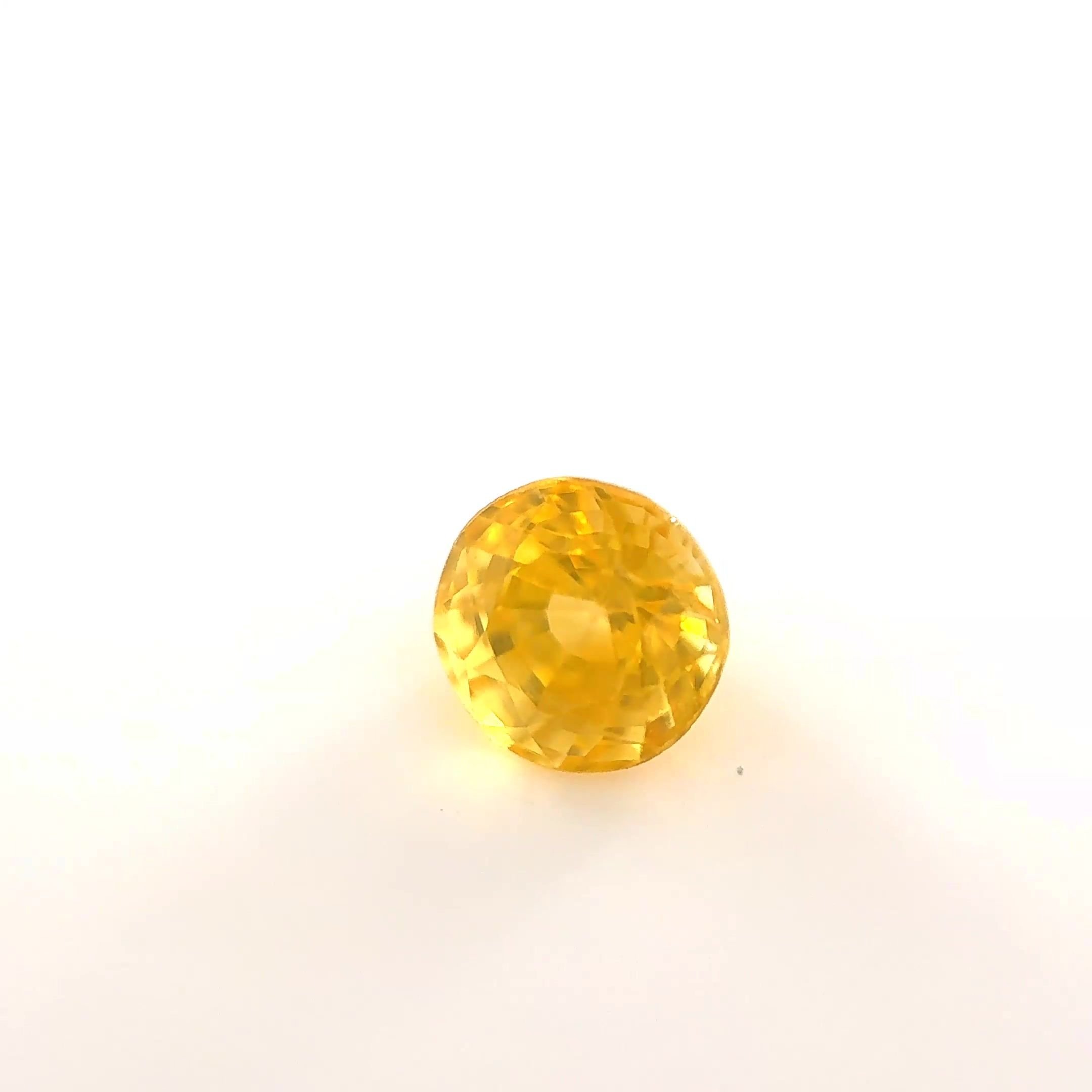 0.56 Carat Yellow Round Sapphire
