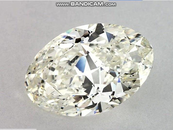 9.13ct K SI1 Rare Carat Ideal Cut Oval Diamond