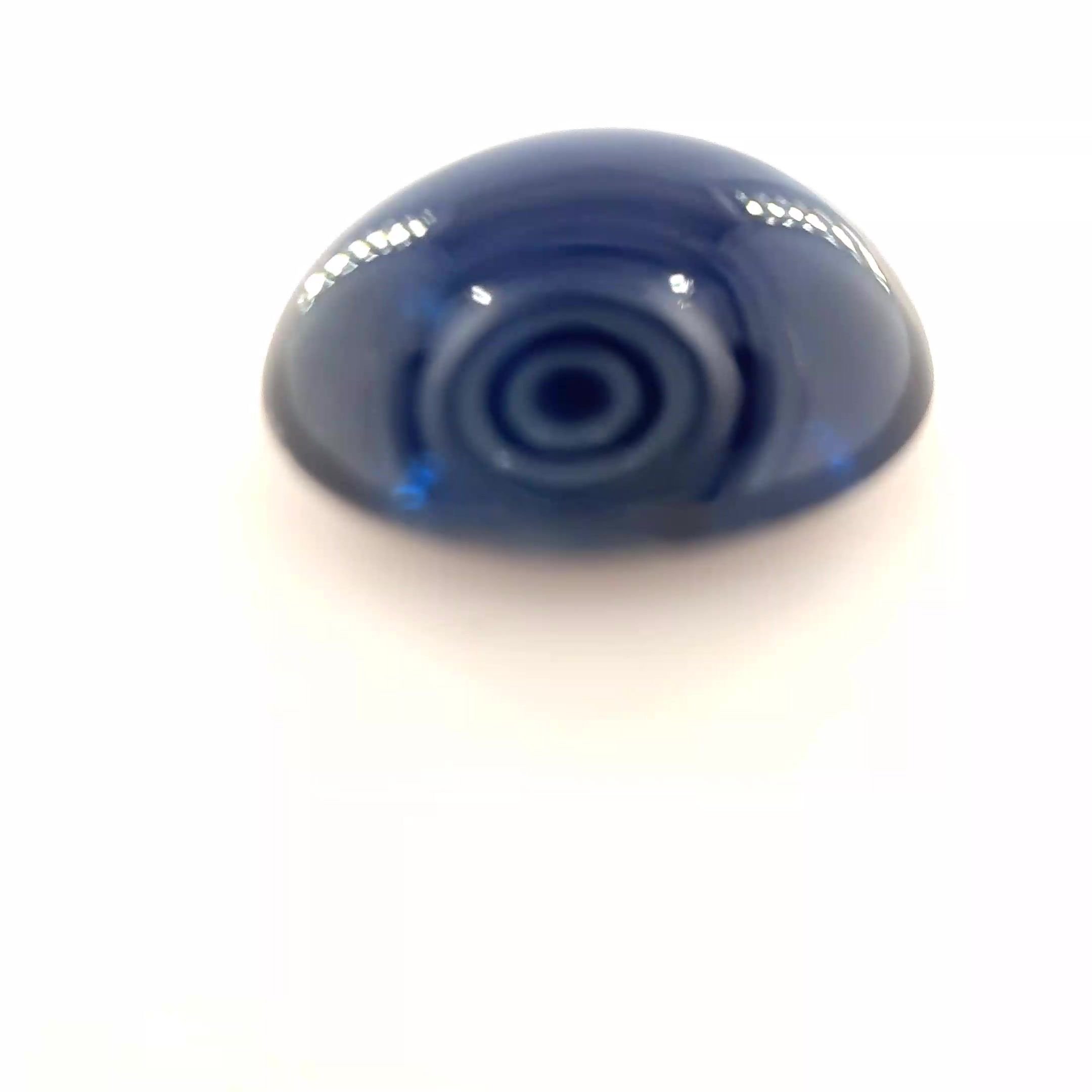 6.30 Carat Deep Blue Oval Sapphire