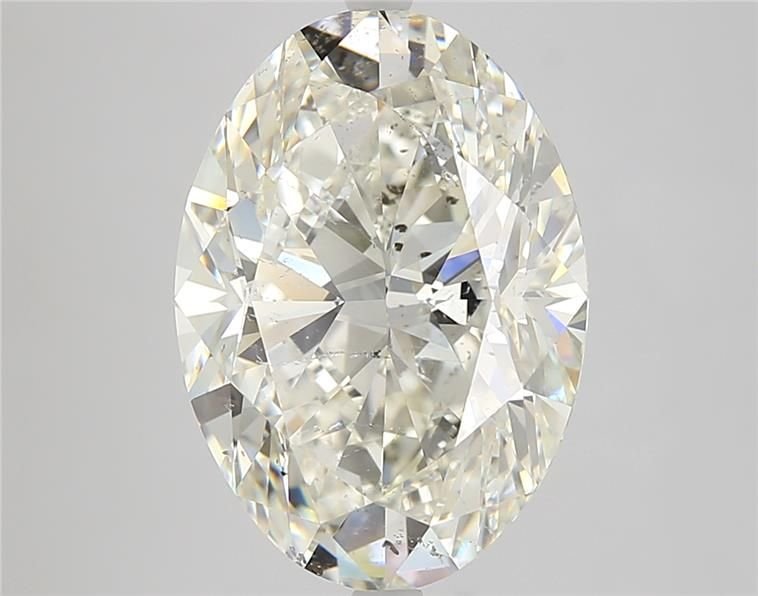 7.03ct K SI2 Rare Carat Ideal Cut Oval Diamond