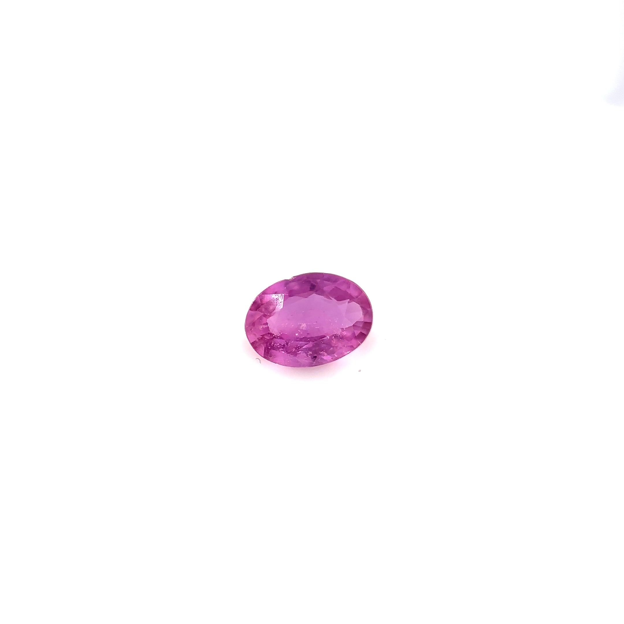 0.83 Carat Vivid Pink Oval Sapphire