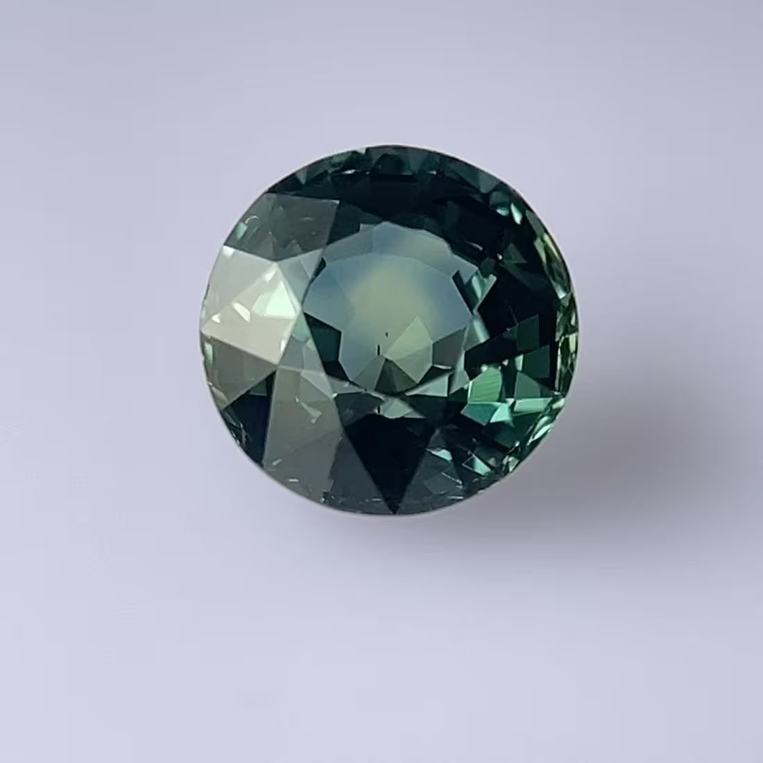 5.02 Carat Teal Round Sapphire