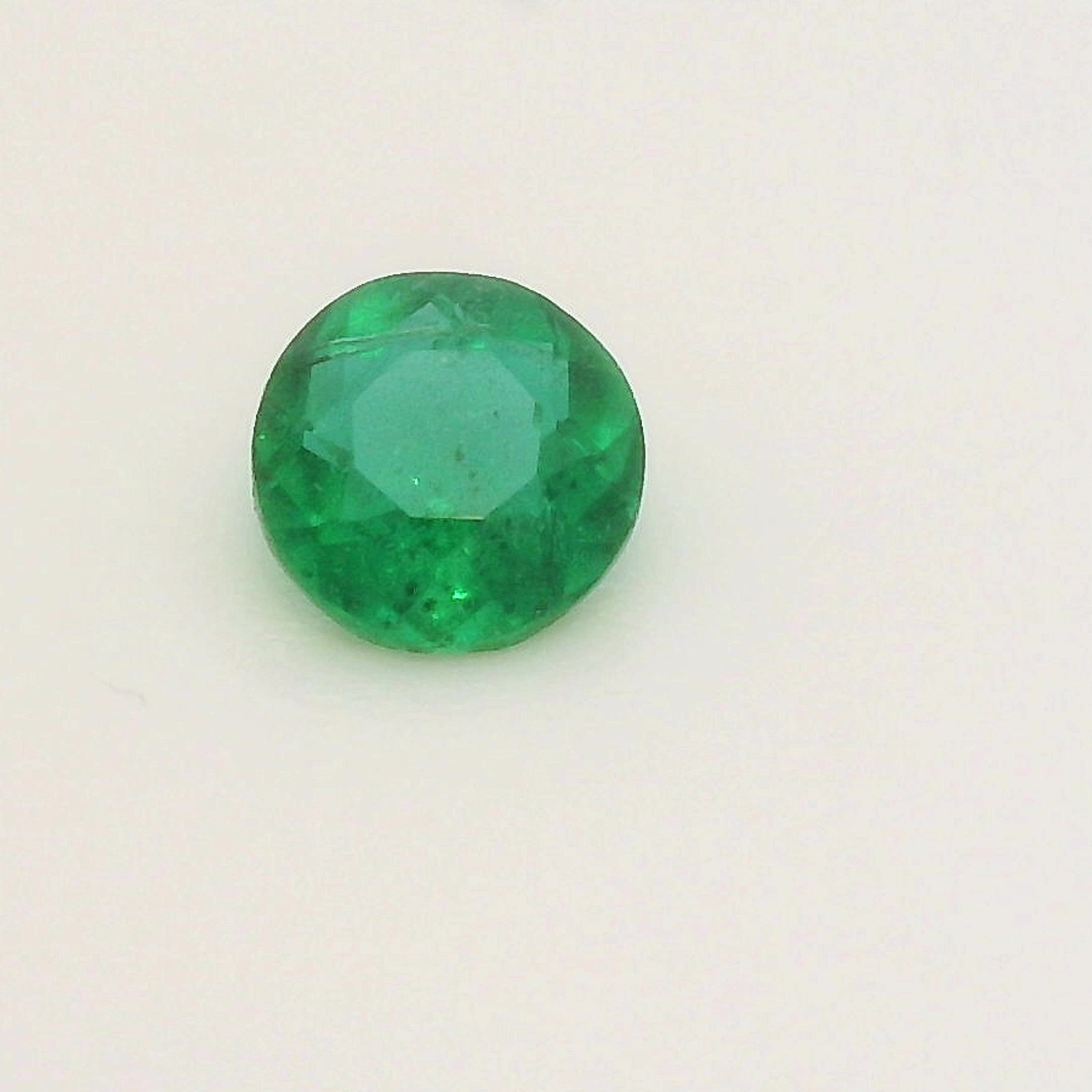 0.20 Carat Green Round Emerald