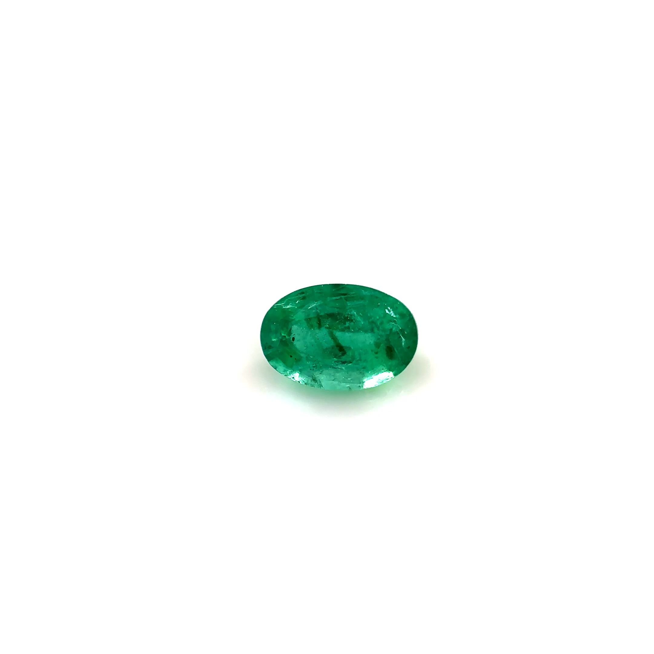 0.52 Carat Vivid Green Oval Emerald