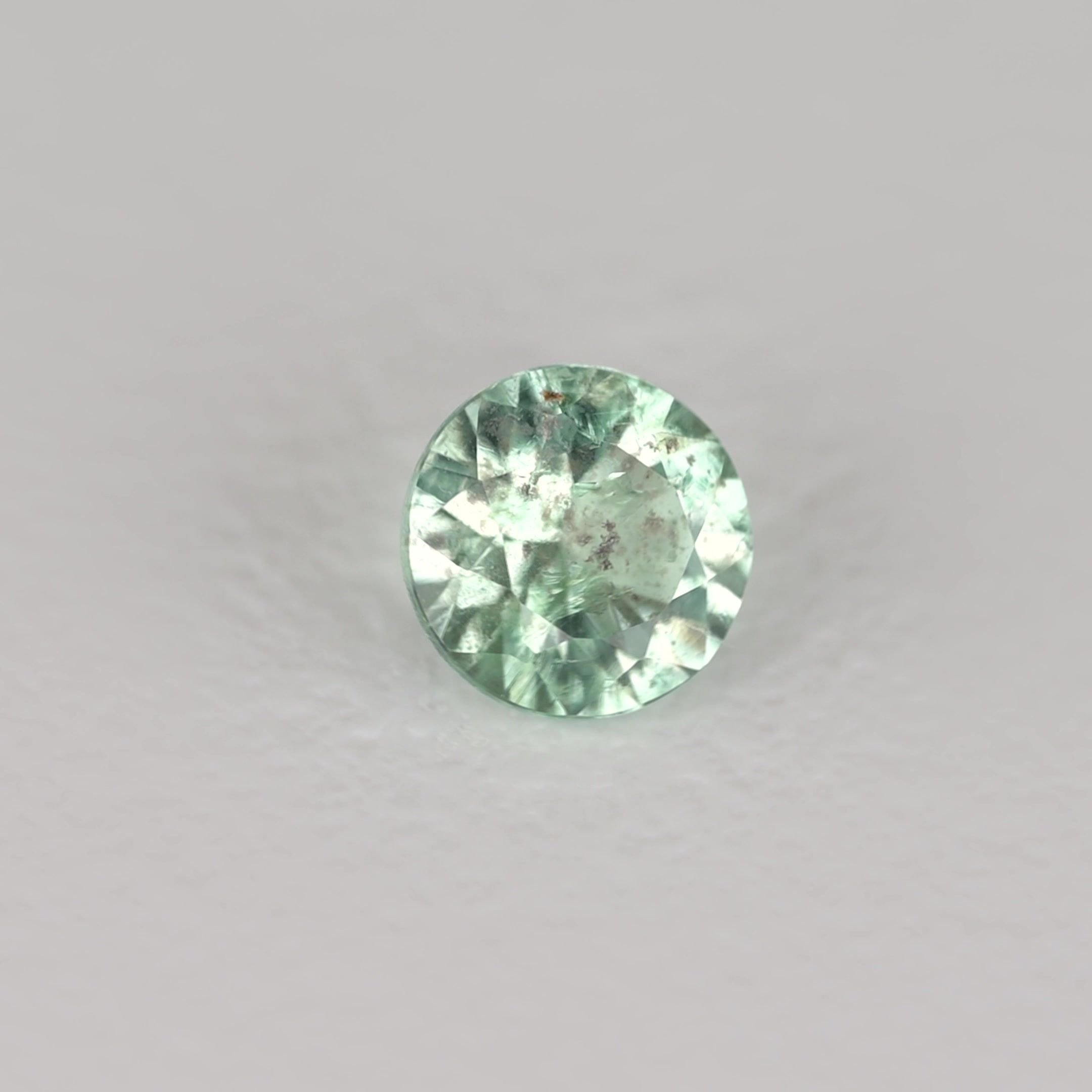 0.16 Carat Green Round Emerald