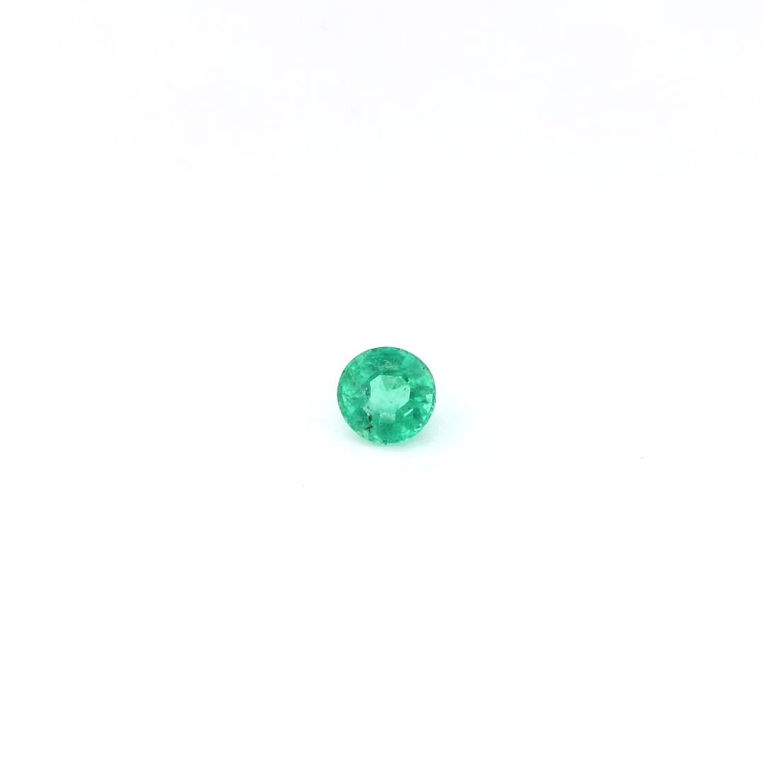 0.33 Carat Green Round Emerald