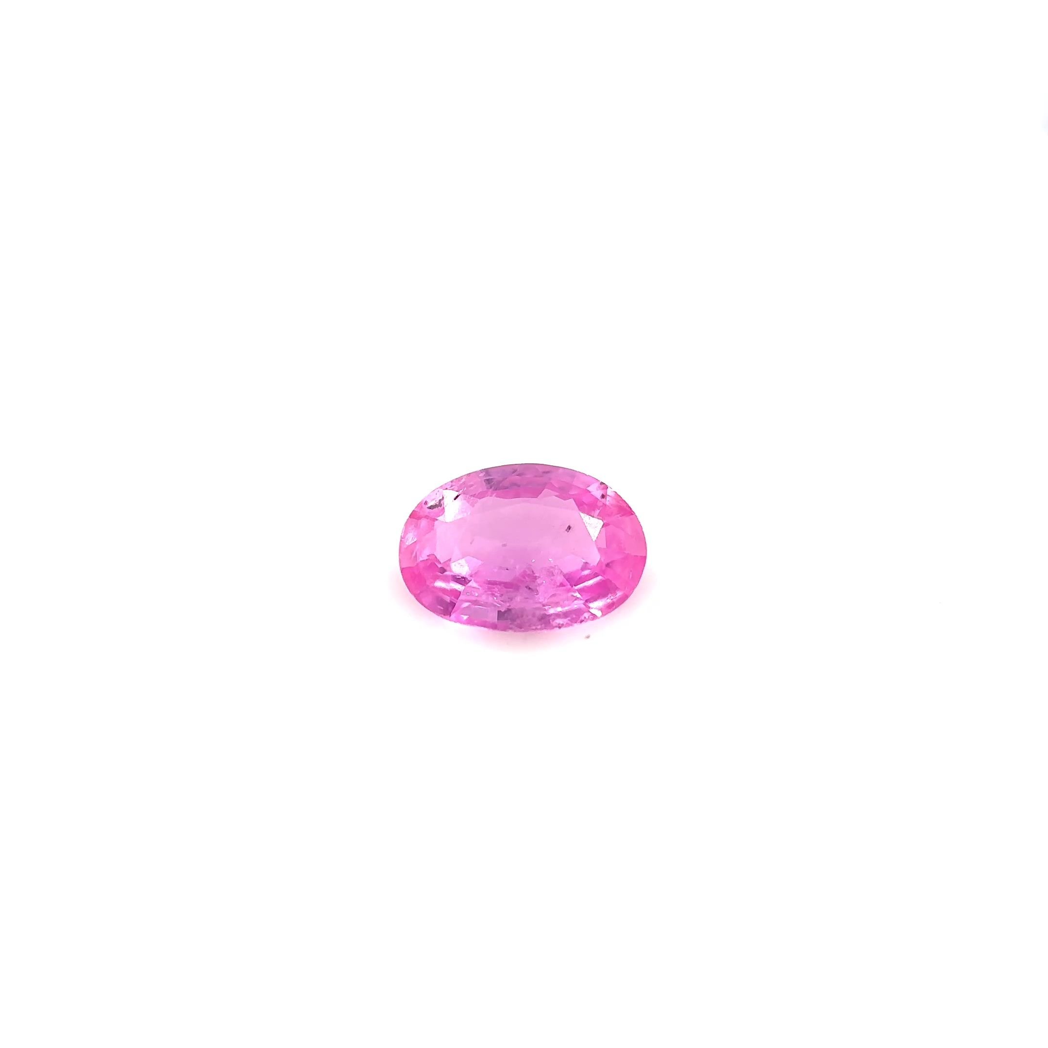 0.72 Carat Vivid Pink Oval Sapphire