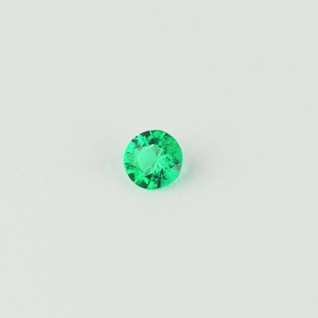 0.07 Carat Intense Green Round Emerald