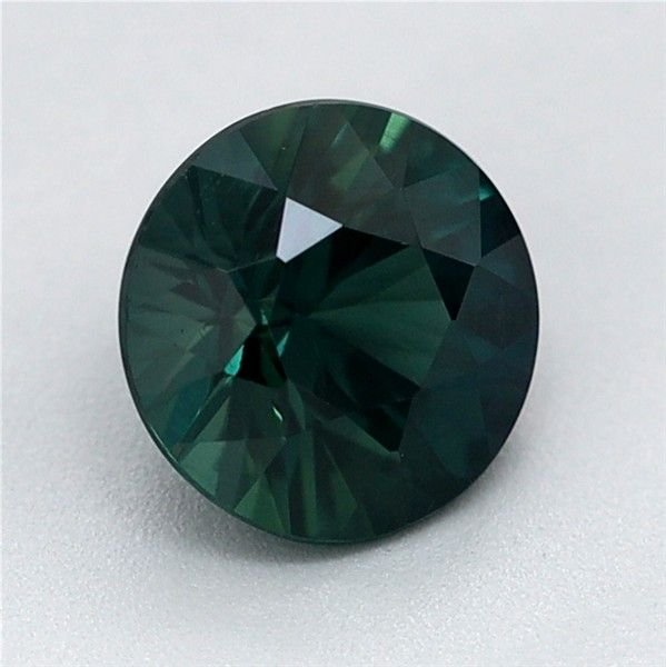 0.62 Carat Teal Round Sapphire