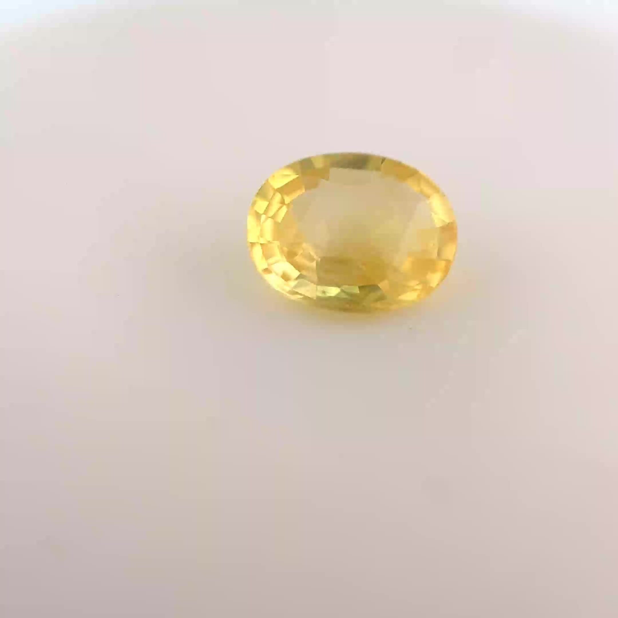 0.78 Carat Light Yellow Oval Sapphire