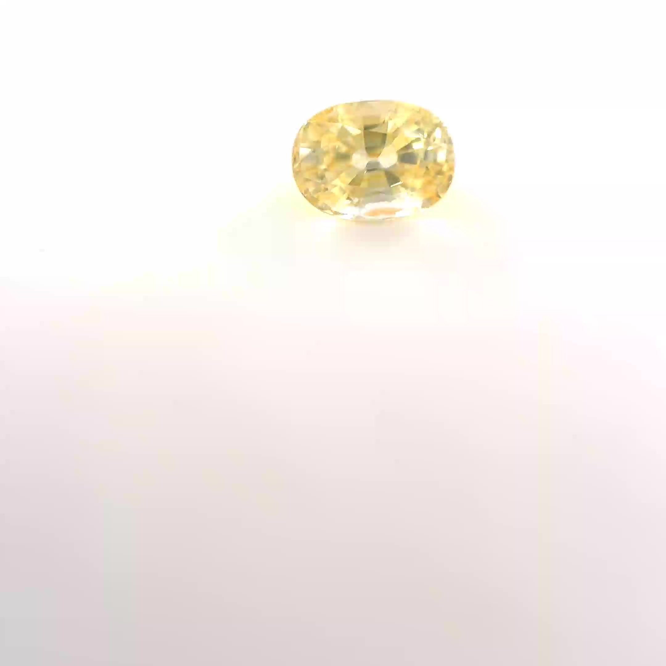 0.71 Carat Light Yellow Oval Sapphire