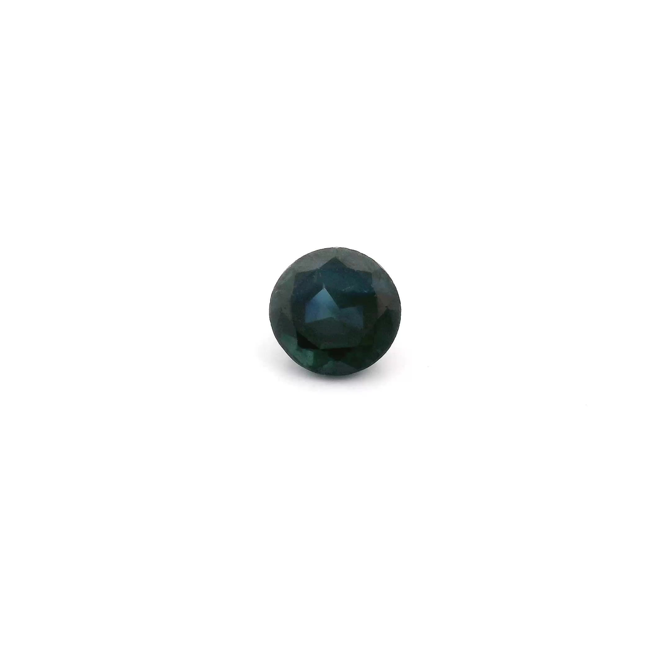 0.57 Carat Deep Blue Round Sapphire