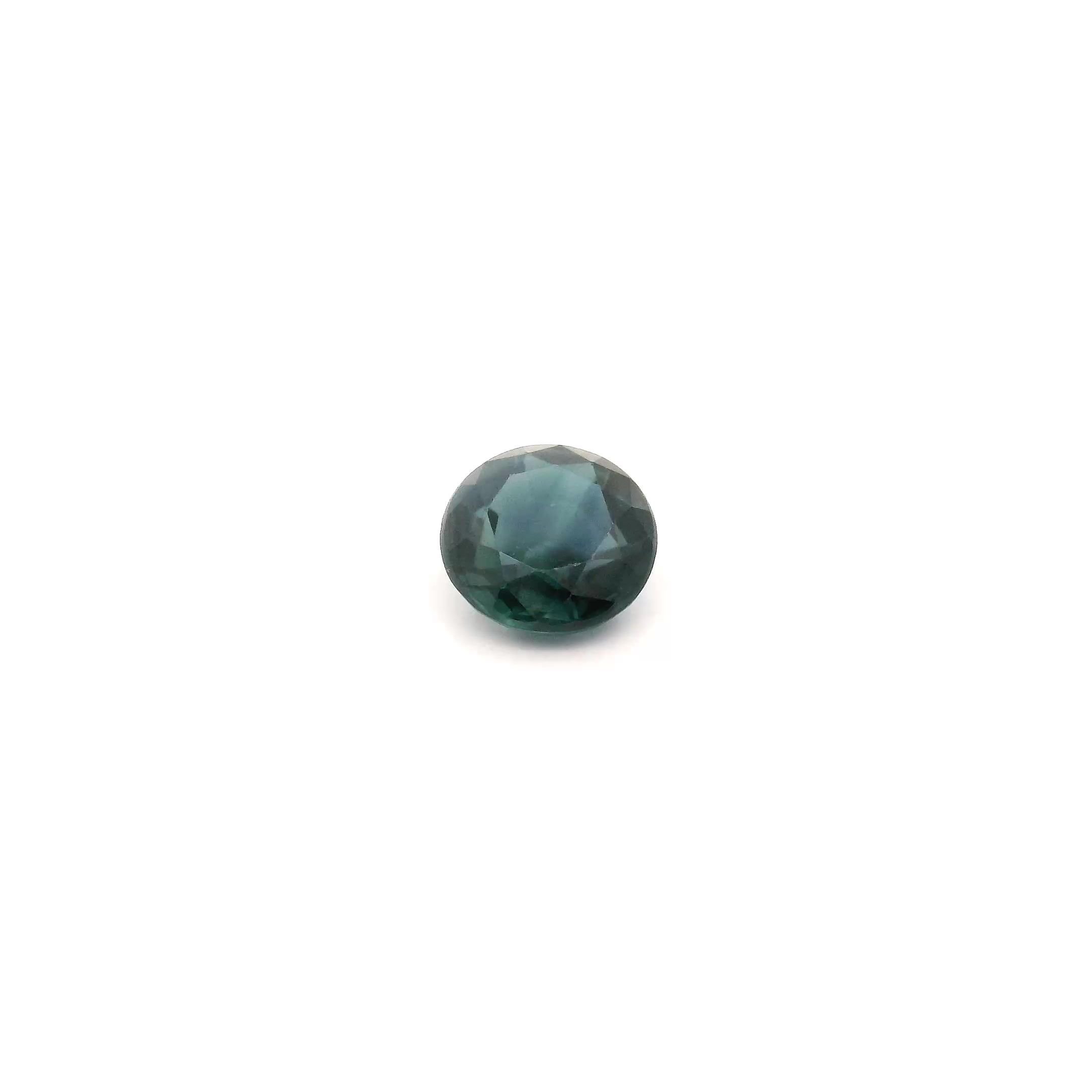 0.59 Carat Deep Blue Round Sapphire