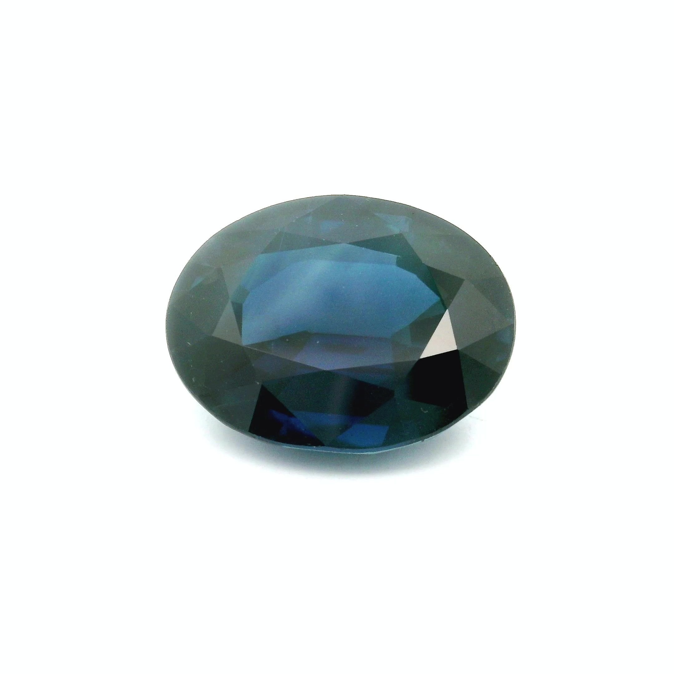 12.47 Carat Deep Blue Oval Sapphire