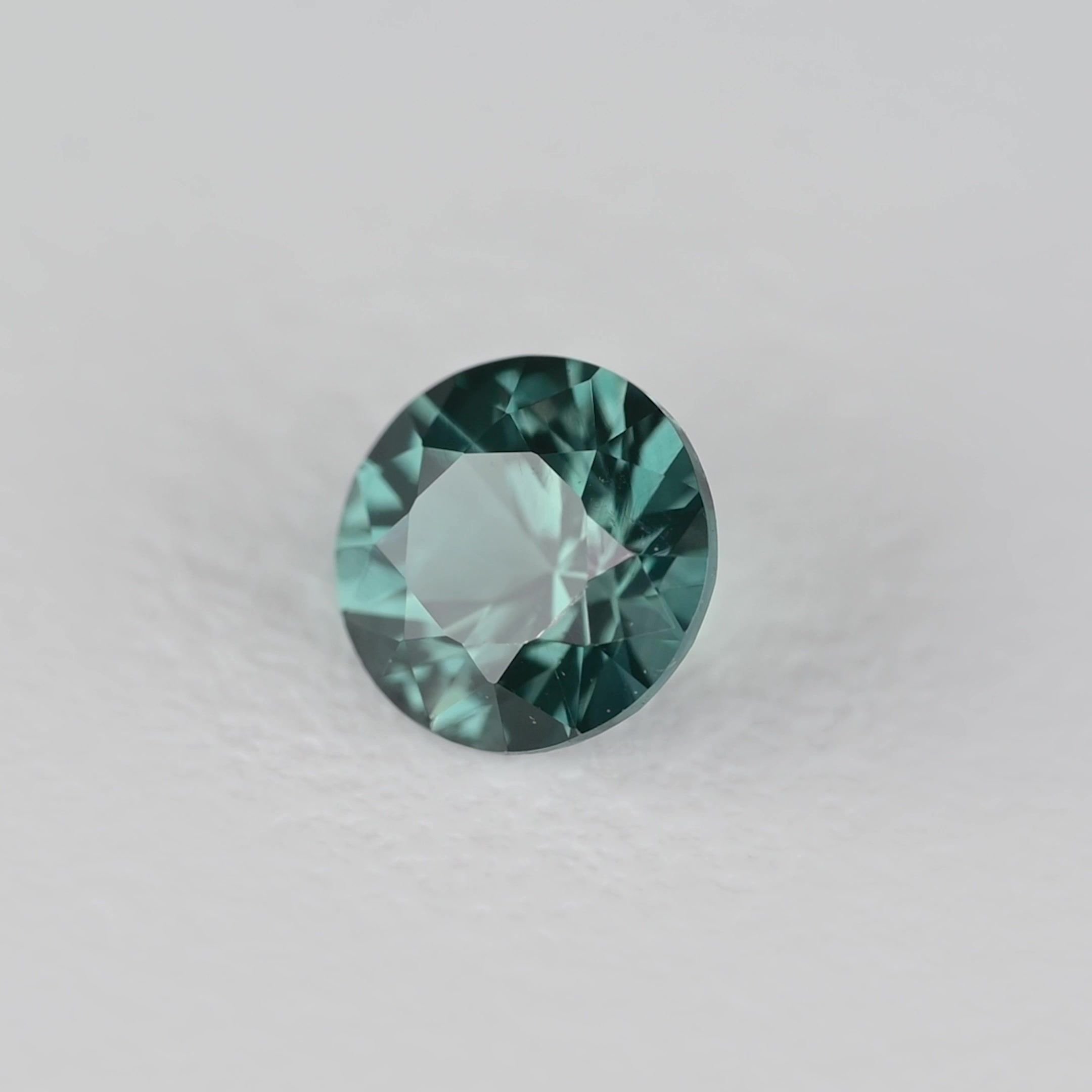 0.31 Carat Teal Round Sapphire