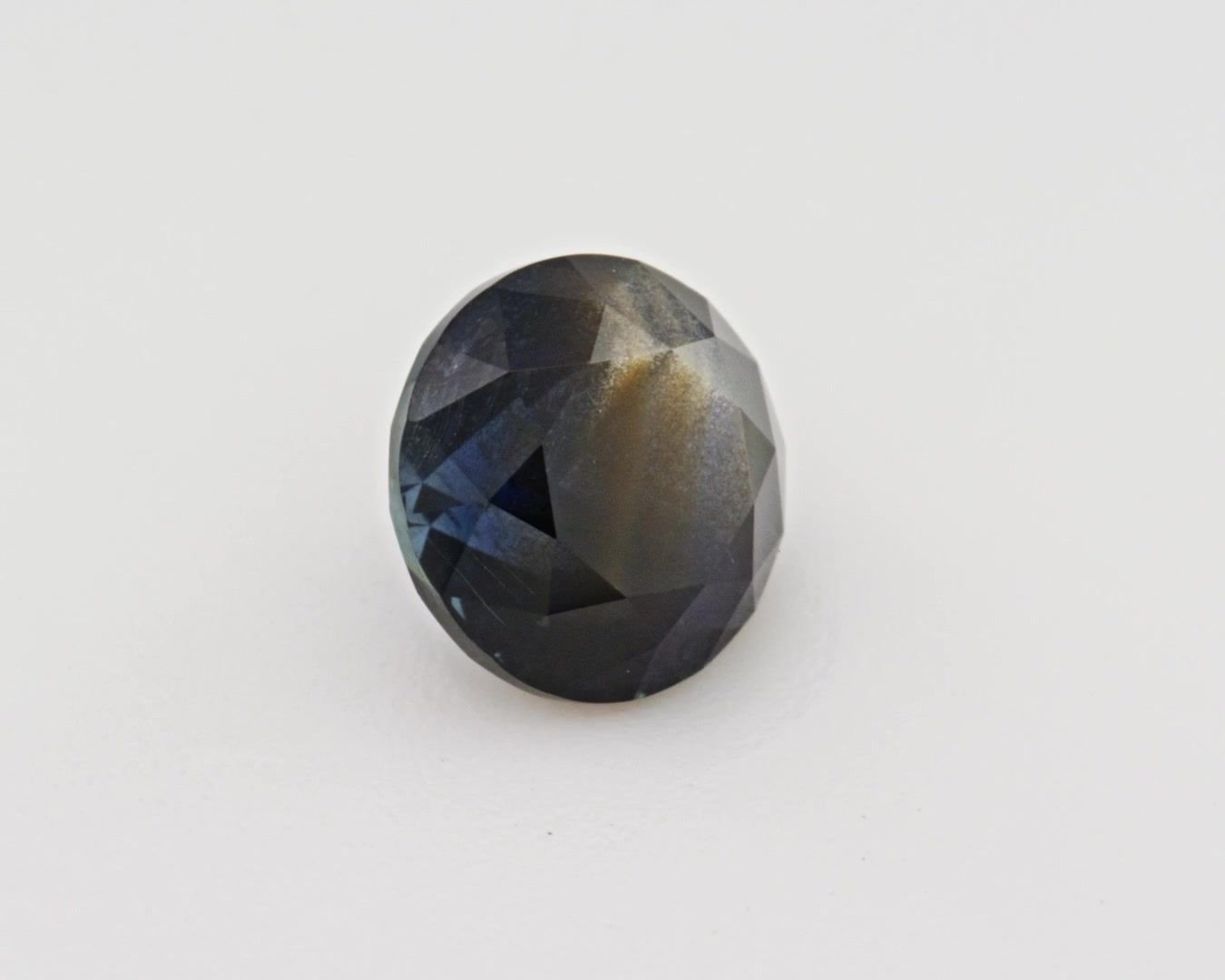 0.94 Carat Teal Round Sapphire