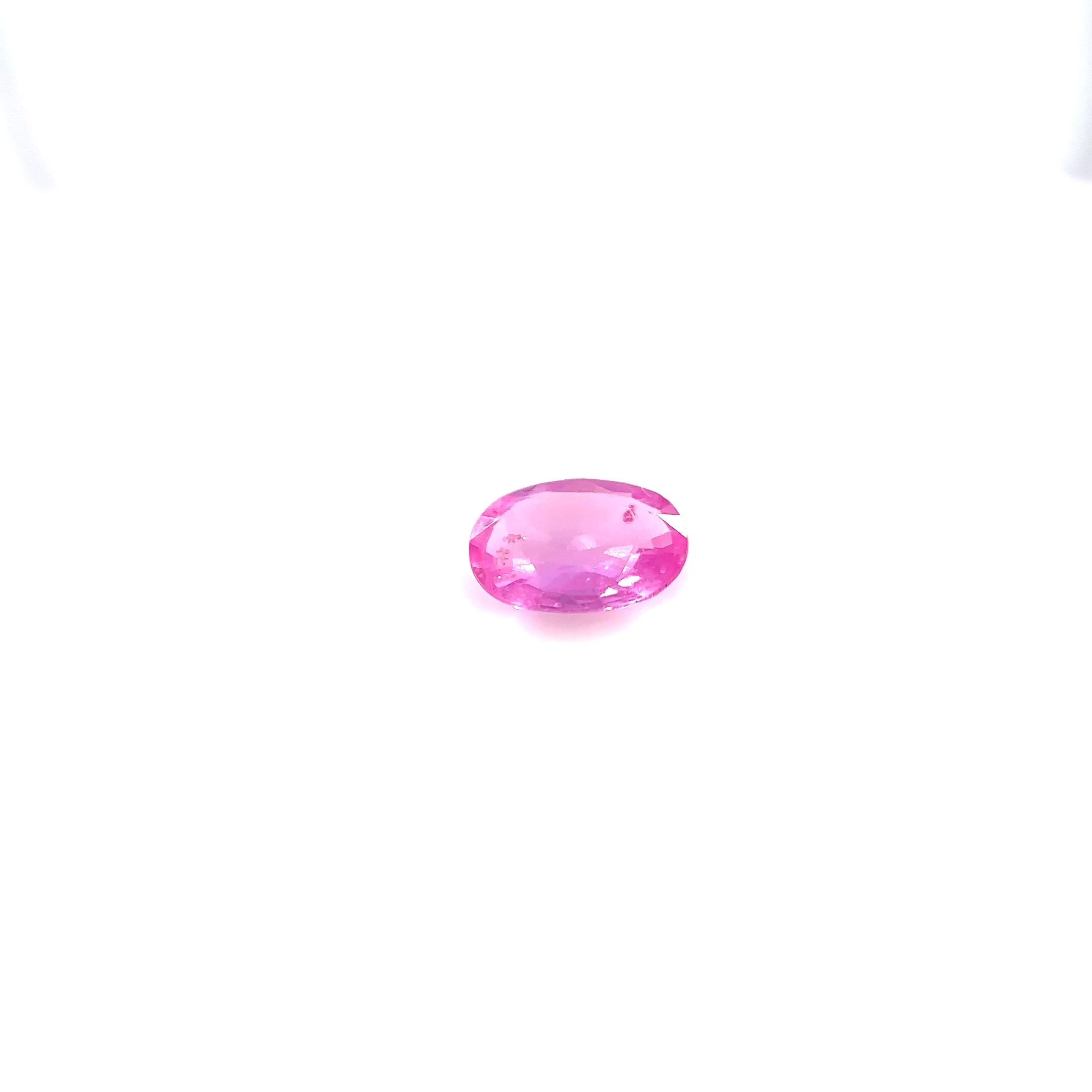 0.77 Carat Vivid Pink Oval Sapphire