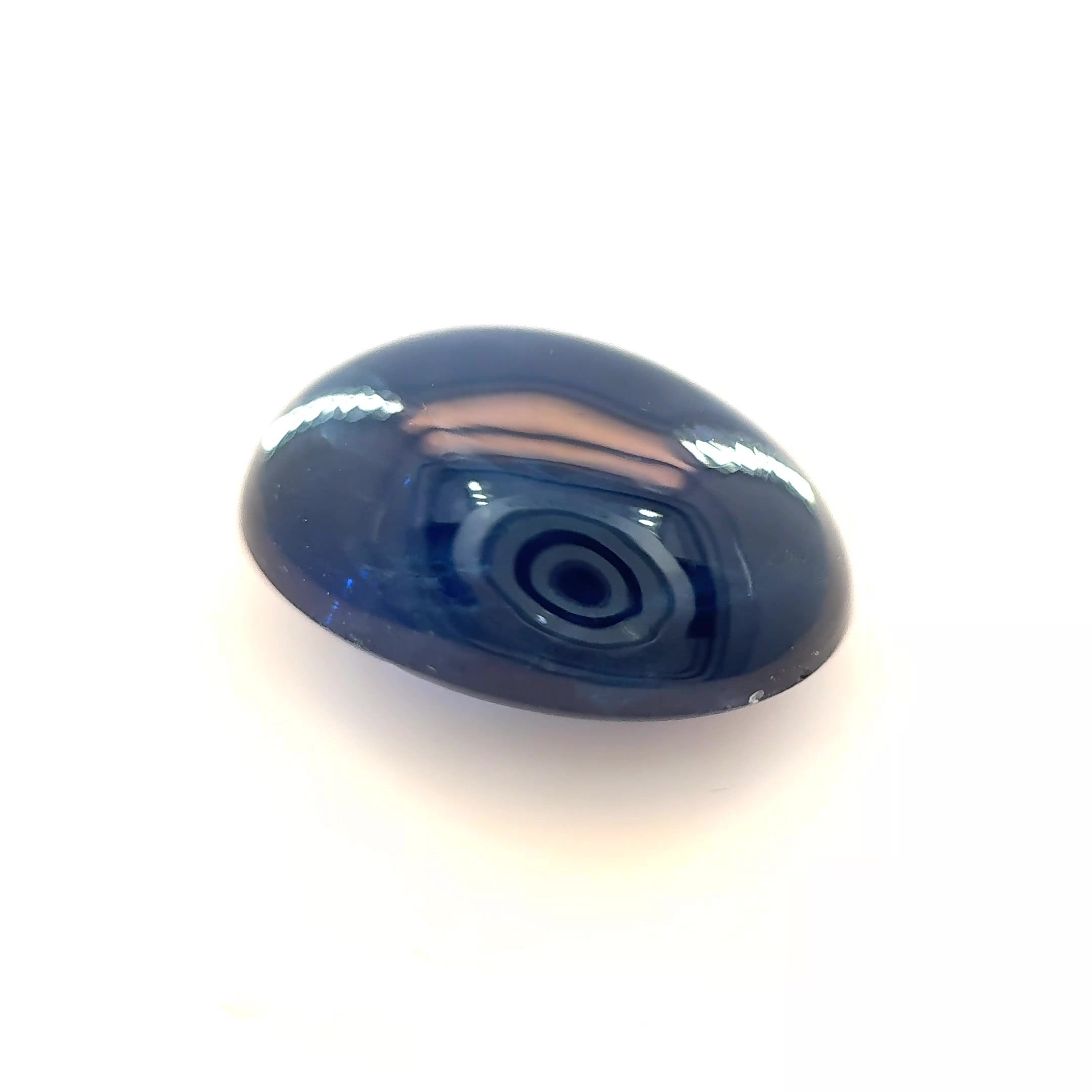 6.96 Carat Deep Blue Oval Sapphire
