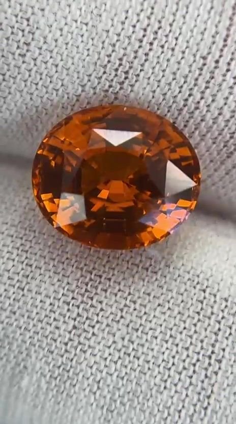 6.07 Carat Orange Oval Sapphire