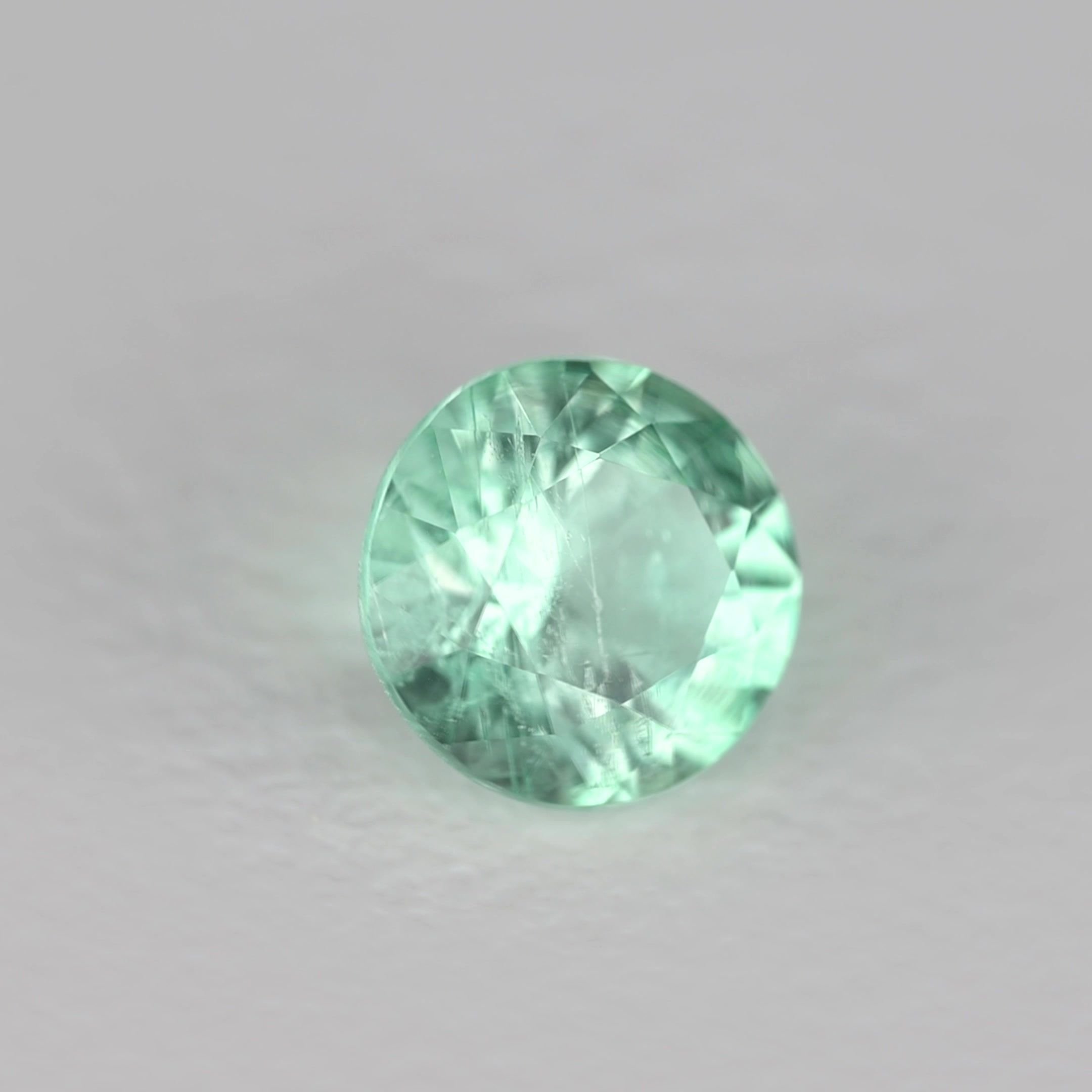 0.33 Carat Green Round Emerald