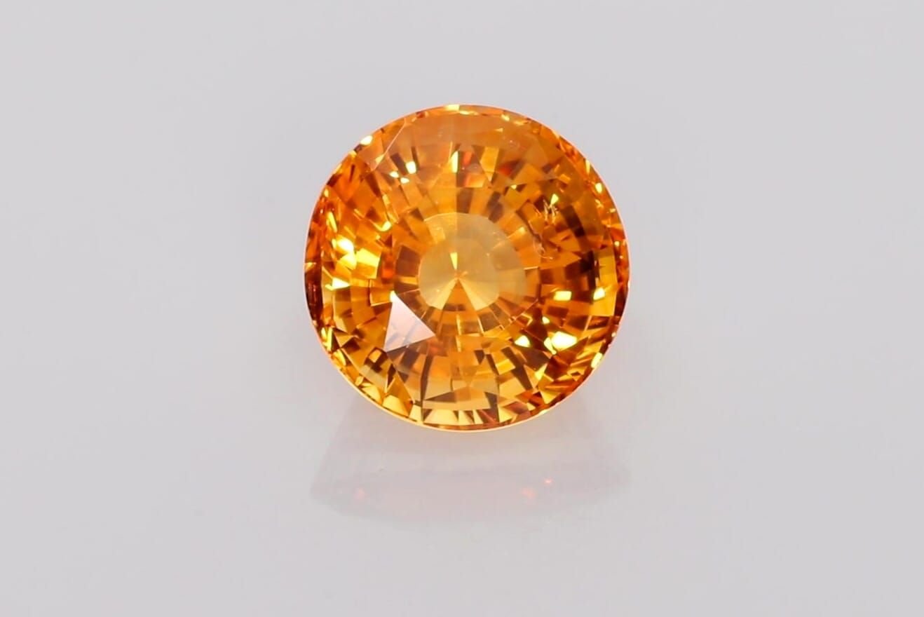 4.02 Carat Orange Round Sapphire