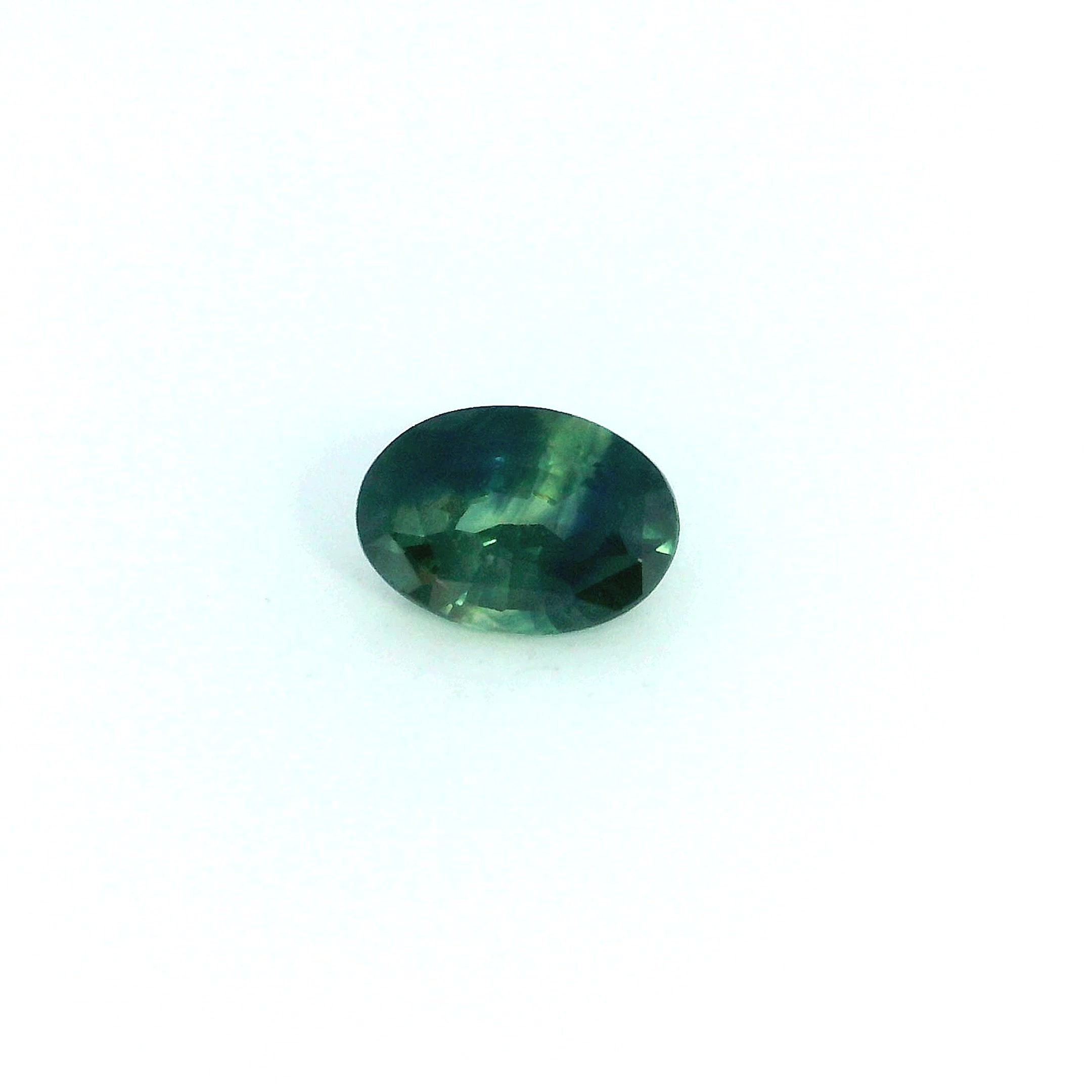 0.54 Carat Green Oval Sapphire