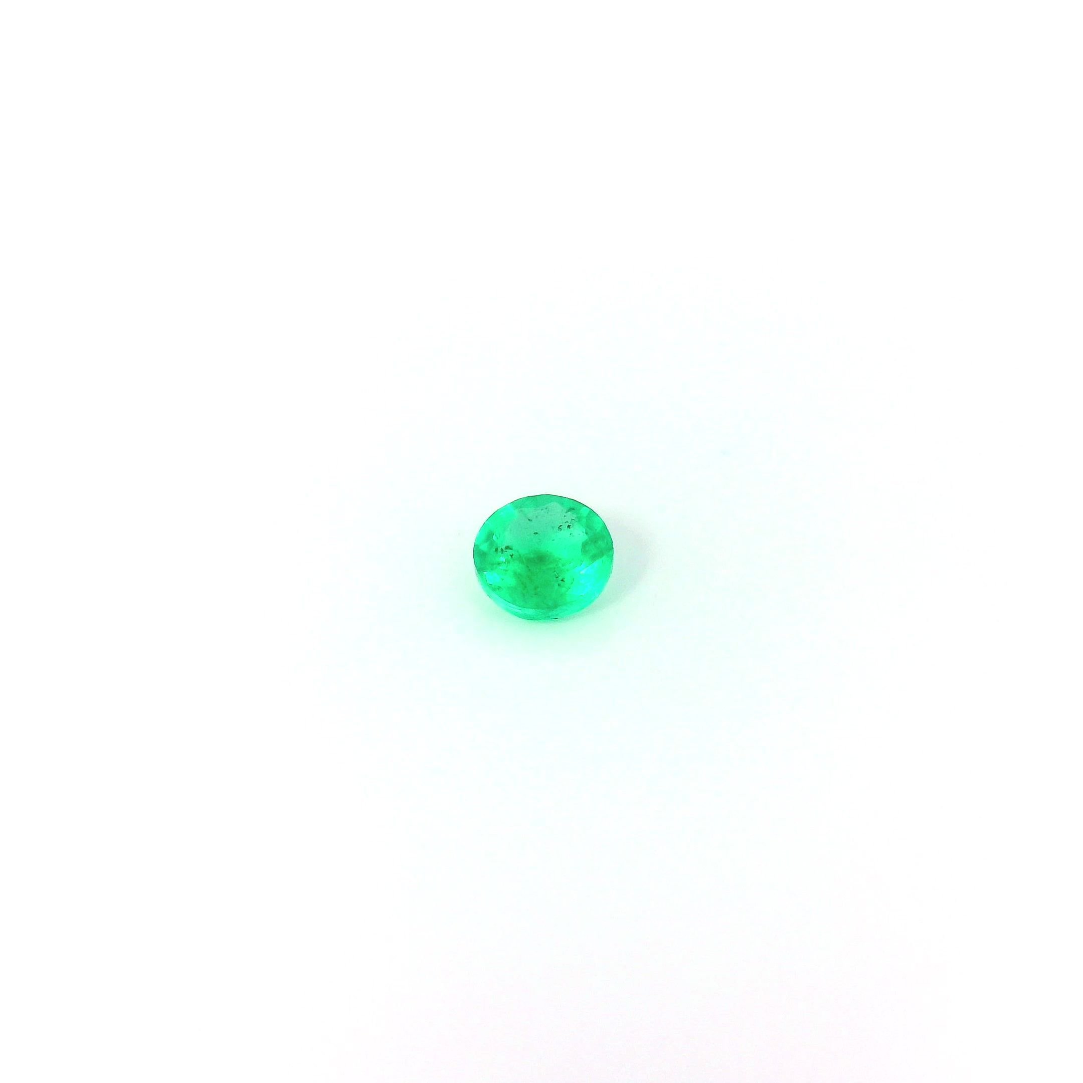 0.13 Carat Green Round Emerald