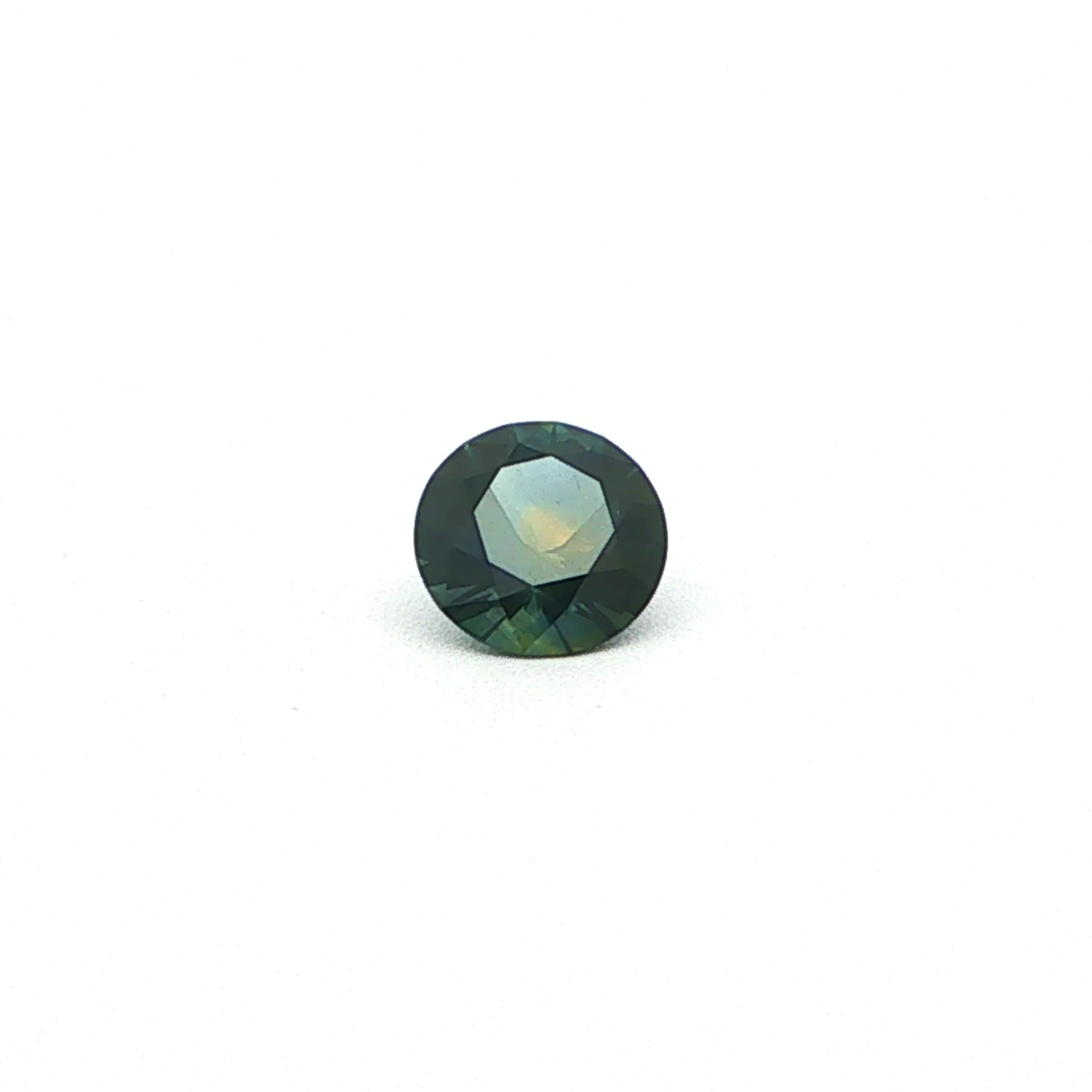 0.72 Carat Dark Blue Round Sapphire