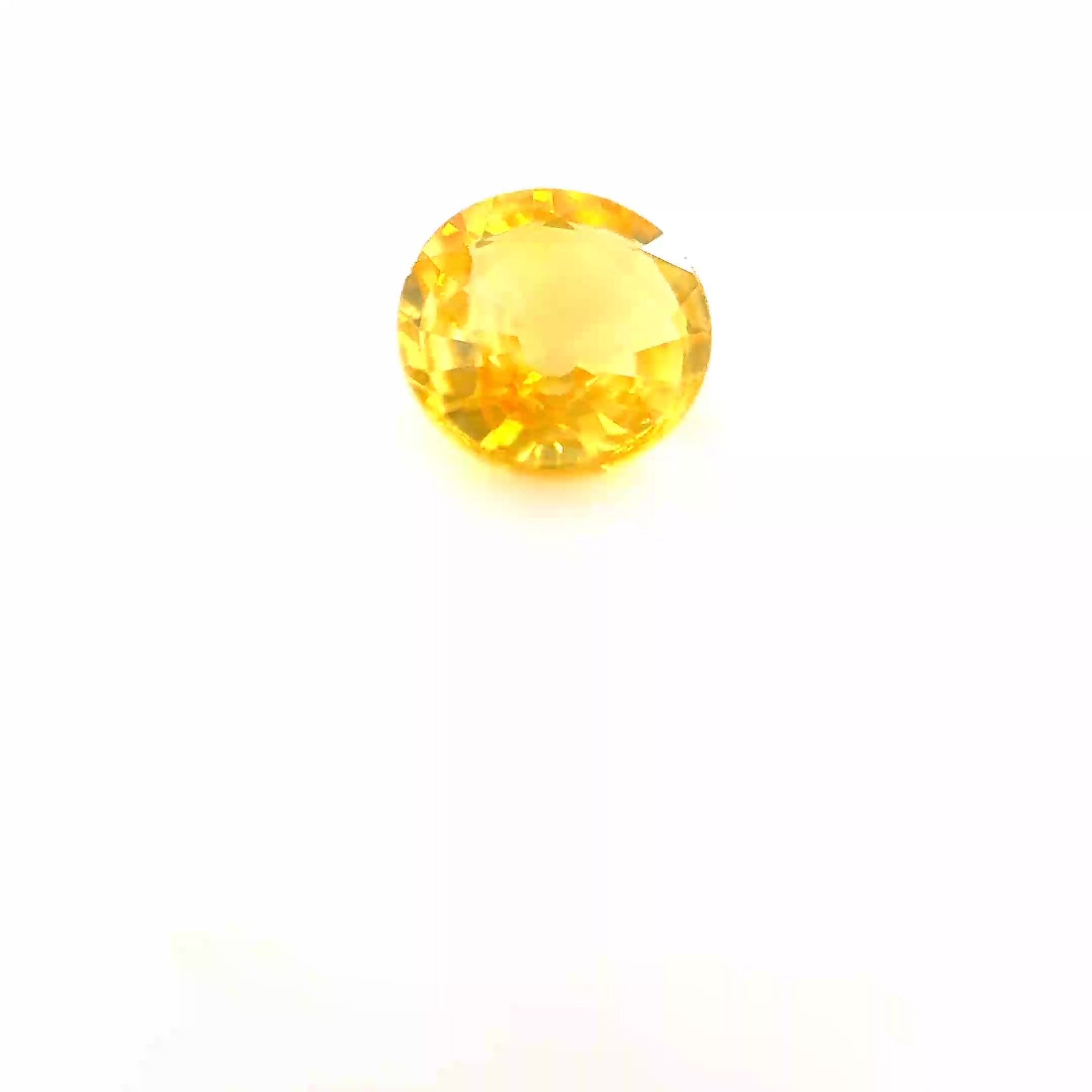 0.69 Carat Yellow Round Sapphire