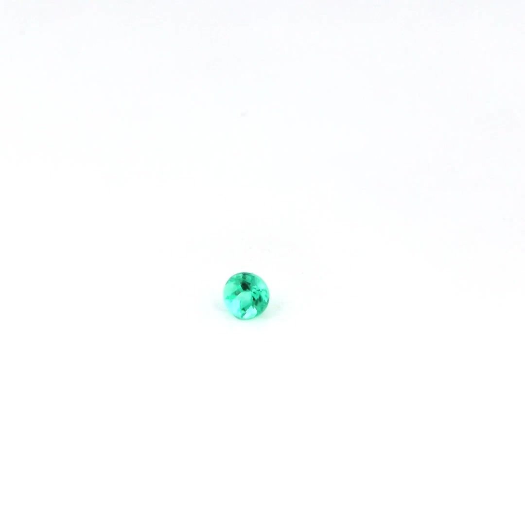 0.14 Carat Green Round Emerald
