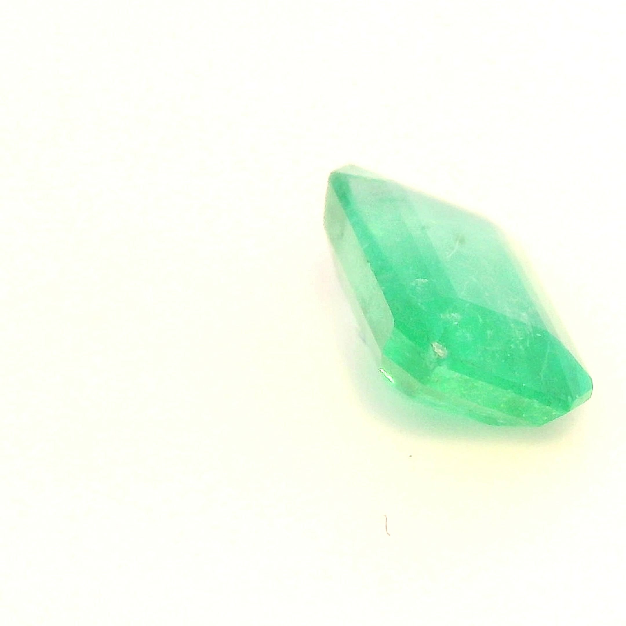 0.79 Carat Light Green Emerald-Cut Emerald