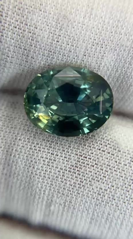 6.17 Carat Green Oval Sapphire