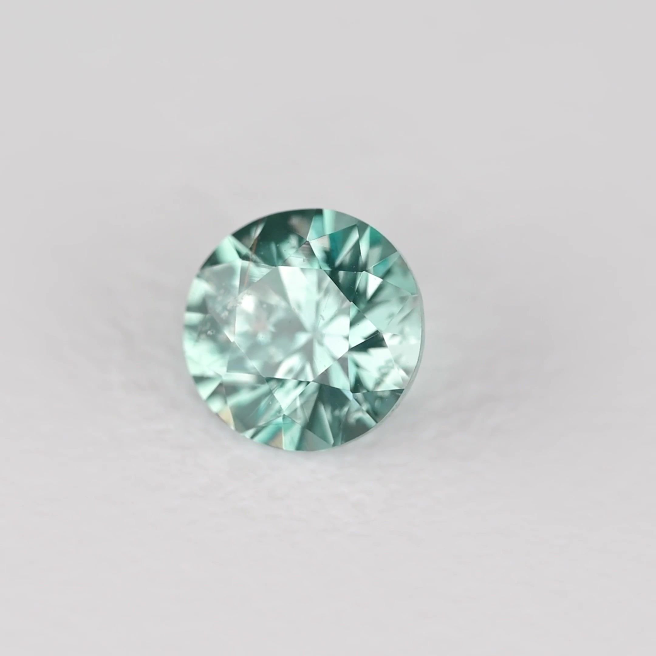 0.35 Carat Teal Round Sapphire