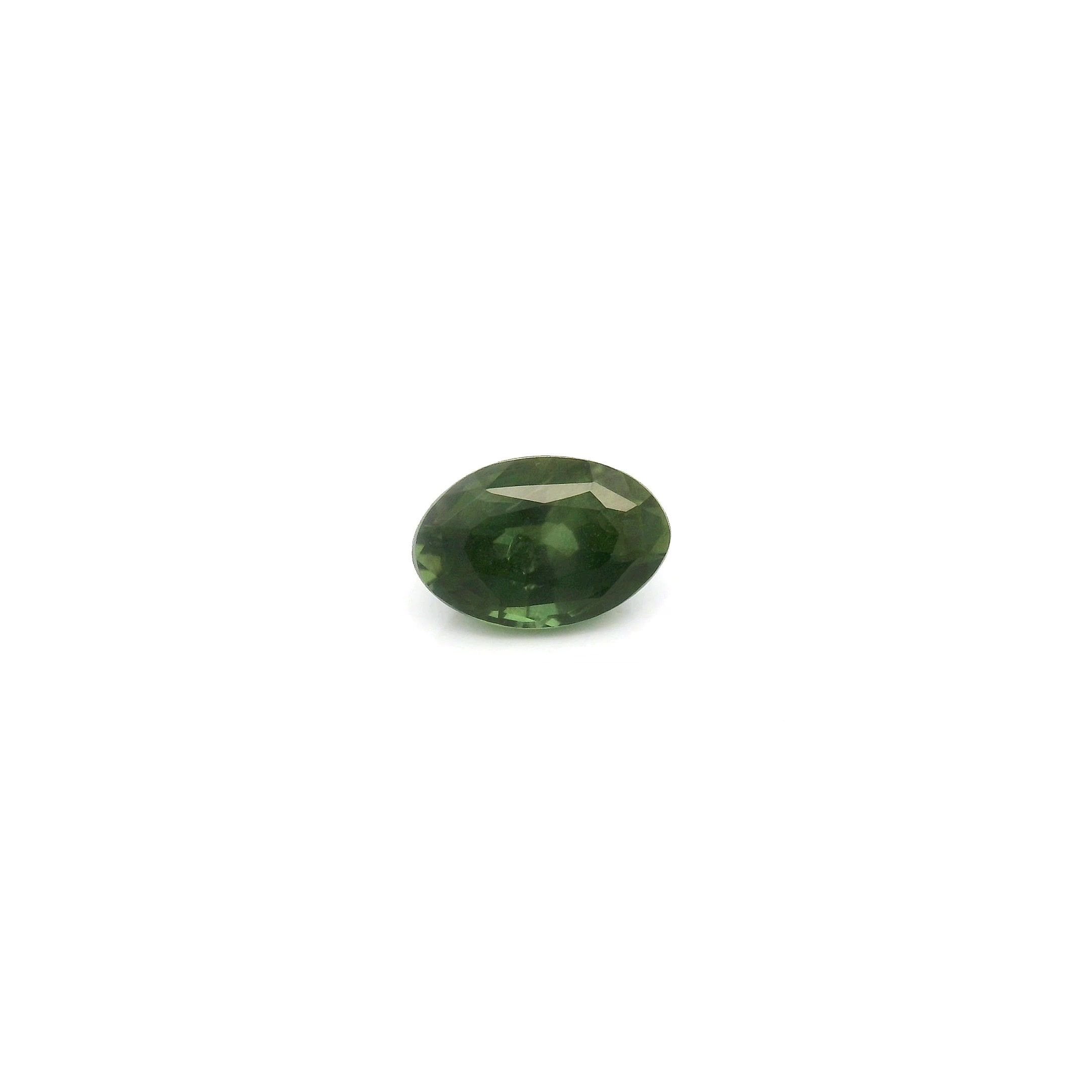 0.65 Carat Deep Green Oval Sapphire