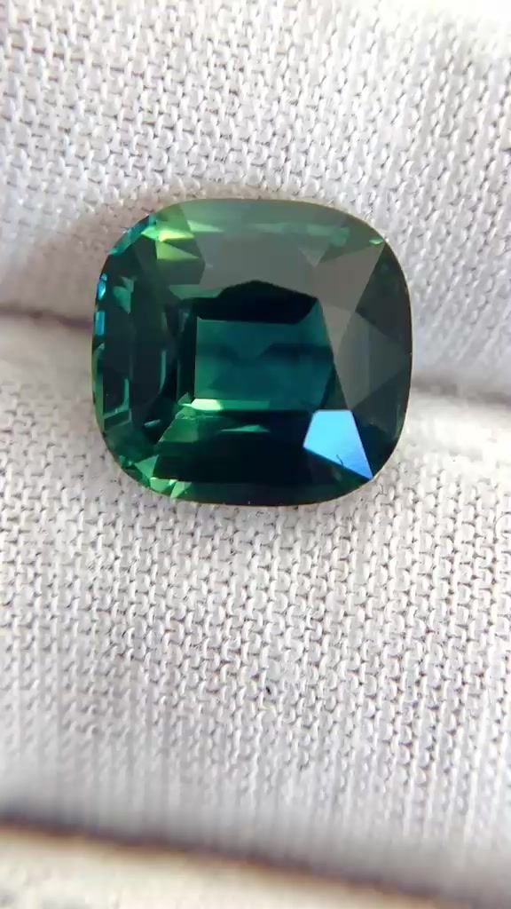 7.03 Carat Green Cushion Sapphire