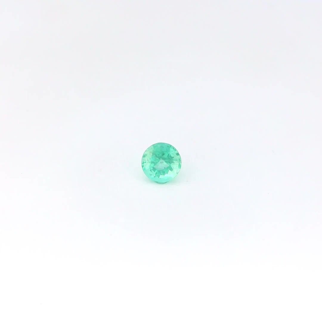 0.29 Carat Light Green Round Emerald