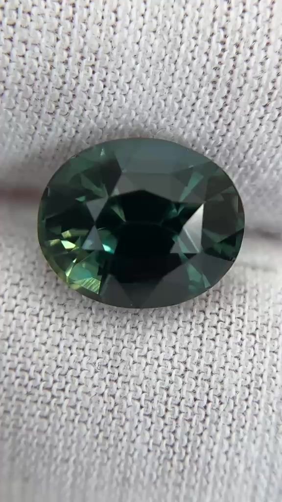 6.01 Carat Green Oval Sapphire