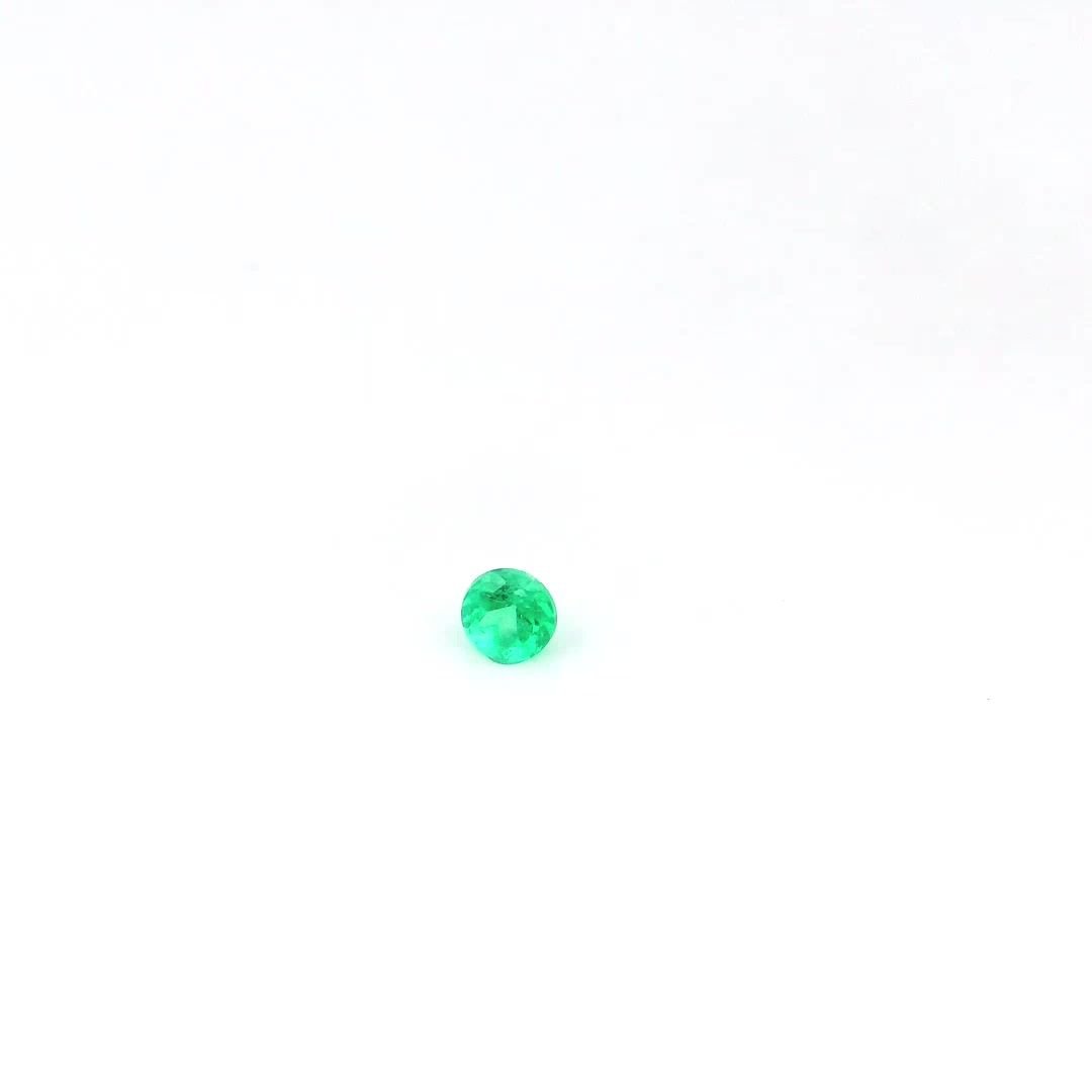 0.13 Carat Green Round Emerald
