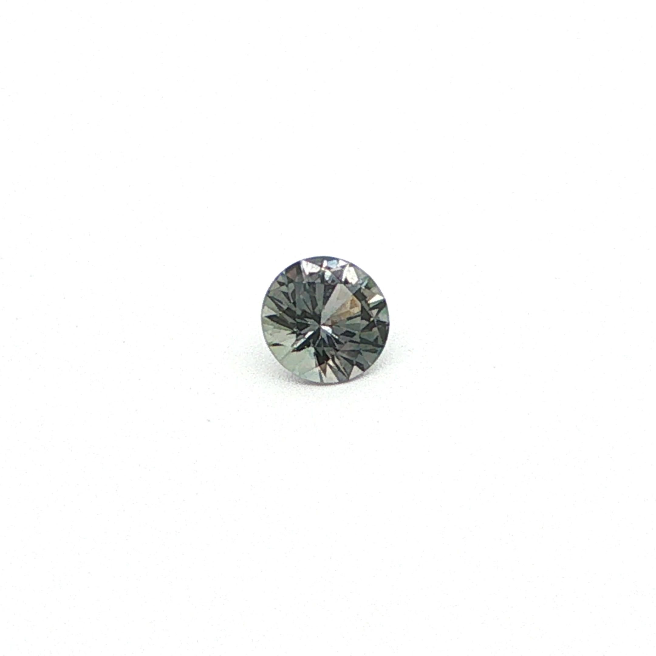 0.56 Carat Gray Round Sapphire