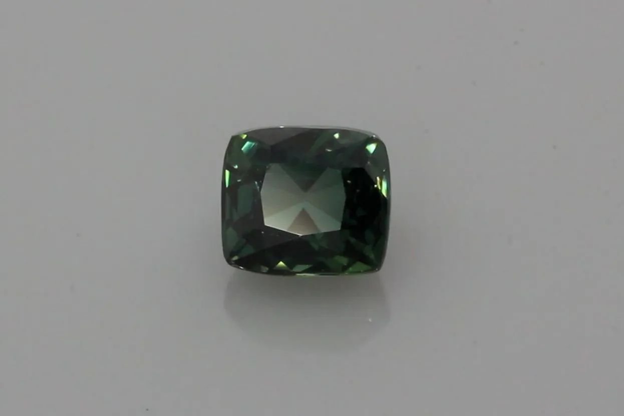 1.48 Carat Vivid Teal Cushion Sapphire