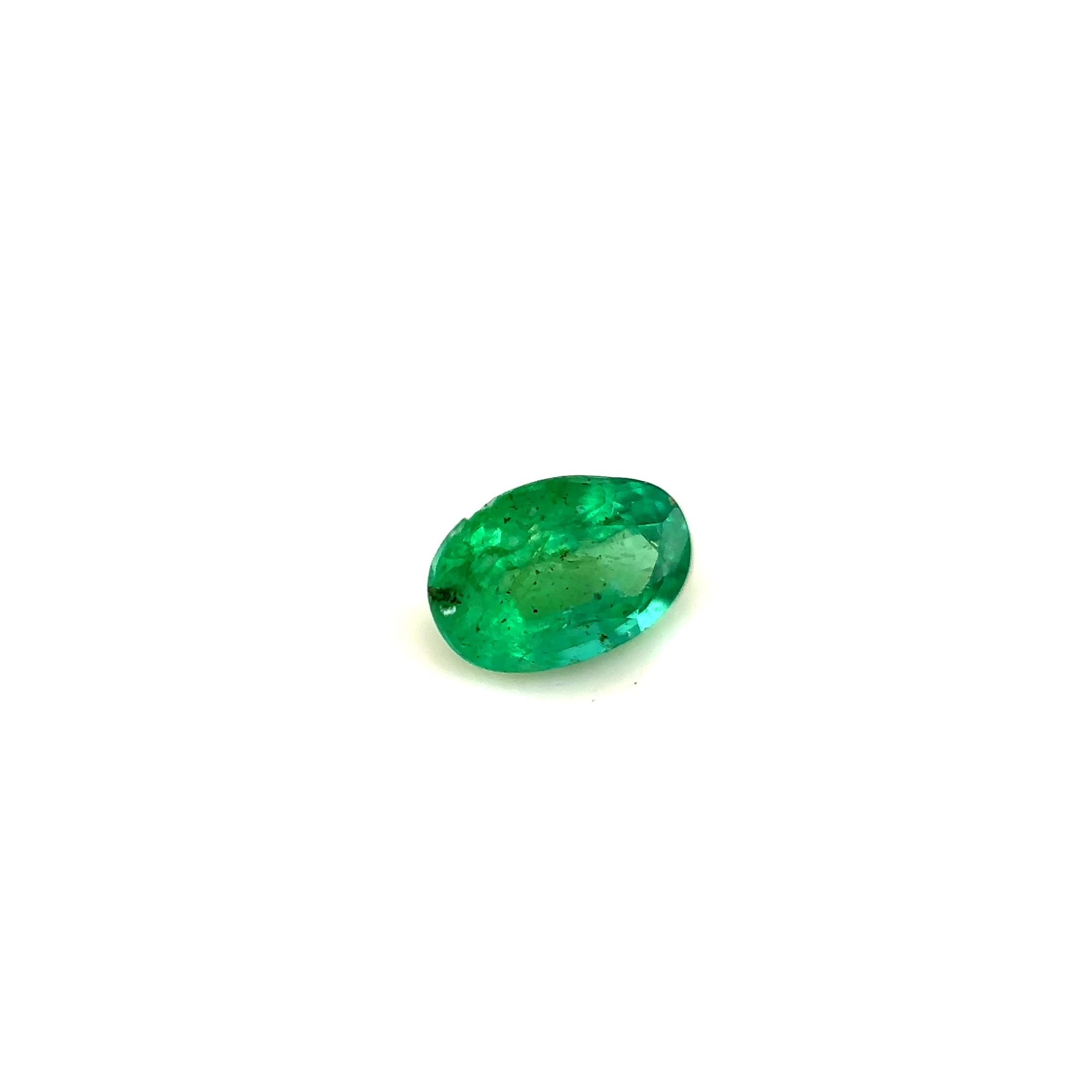 0.76 Carat Vivid Green Oval Emerald